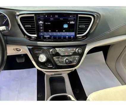 2021 Chrysler Pacifica Hybrid Touring L is a Silver 2021 Chrysler Pacifica Hybrid Touring L Hybrid in Sherman TX