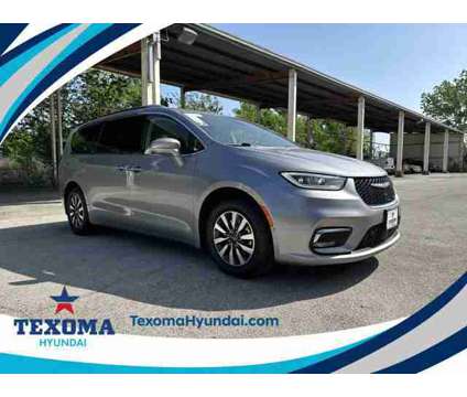 2021 Chrysler Pacifica Hybrid Touring L is a Silver 2021 Chrysler Pacifica Hybrid Touring L Hybrid in Sherman TX