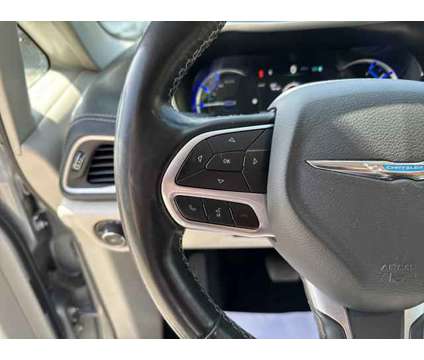 2021 Chrysler Pacifica Hybrid Touring L is a Silver 2021 Chrysler Pacifica Hybrid Touring L Hybrid in Sherman TX