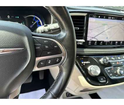 2021 Chrysler Pacifica Hybrid Touring L is a Silver 2021 Chrysler Pacifica Hybrid Touring L Hybrid in Sherman TX