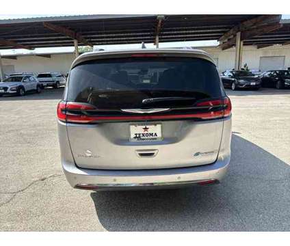 2021 Chrysler Pacifica Hybrid Touring L is a Silver 2021 Chrysler Pacifica Hybrid Touring L Hybrid in Sherman TX