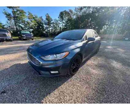 2019 Ford Fusion for sale is a Blue 2019 Ford Fusion Car for Sale in Porter TX