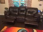 Brown leather sofa and love seat