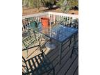 Glass and Metal outside table & chairs Great condition