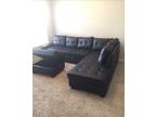 New in Box - 3 pc Reversible sectional with Cupholder and Storage Ottoman