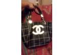 Black channel purse