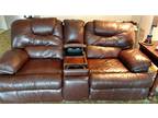 Double recliner with tray and double drink holder
