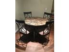 Kitchen Table with four metal upholstered chairs