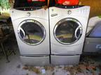 GE Washer/Dryer with Stands.