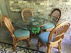 Rattan & glass table with 4 chairs