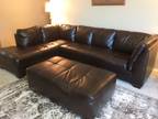 Faux dark brown leather 2 piece couch with ottoman