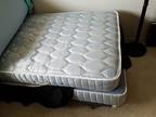 Twin bed with box springs and metal frame