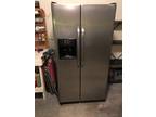 Stainless steel side by side frig-freezer 1 yr old