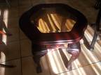 Mahogany and glass coffee table and two identical end tables