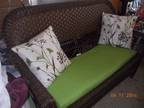 rattan/wicker patio couch and chair w/pillows