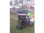 grey black red jogging stroller