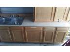Sink with countertop and cabinets