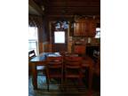 Solid wood and slate top dinette with 4 solid wood chairs