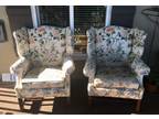 2 matching high back chairs with floral print