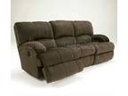 Ashleys love seat and couch with stain warranty