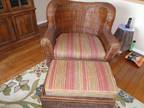 Two brown wicker chair with cushions