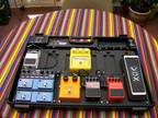 Behringer PB1000 pedal board with pedals