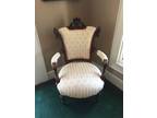 Antique chair matches love seat