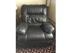 Black leather recliner chair