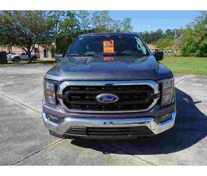 2023 Ford F-150 XLT is a Yellow 2023 Ford F-150 XLT Truck in Hammond LA
