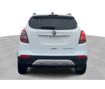 2020UsedBuickUsedEncoreUsedFWD 4dr is a White 2020 Buick Encore Essence Car for Sale in Milwaukee WI
