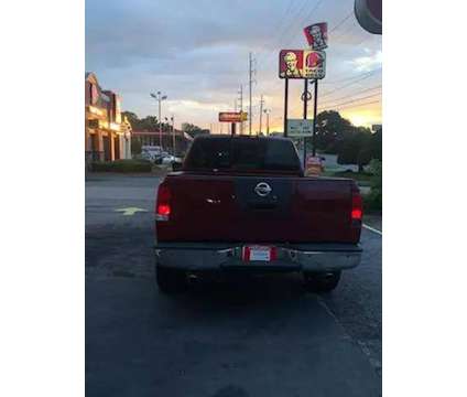 2008 Nissan Titan King Cab for sale is a Red 2008 Nissan Titan King Cab Car for Sale in Marietta GA