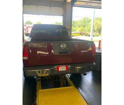 2008 Nissan Titan King Cab for sale is a Red 2008 Nissan Titan King Cab Car for Sale in Marietta GA