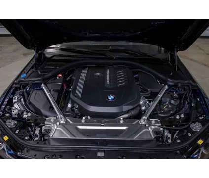 2024 BMW 4 Series xDrive is a Blue 2024 Convertible in Lake Bluff IL