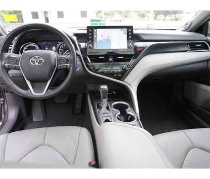 2022 Toyota Camry Hybrid XLE is a Grey 2022 Toyota Camry Hybrid in Hammond LA