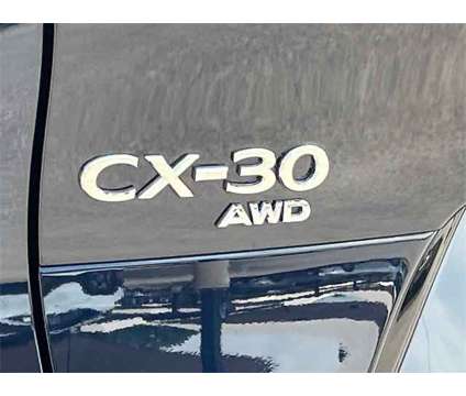 2023 Mazda CX-30 2.5 S Select is a Blue 2023 Mazda CX-3 SUV in Granbury TX