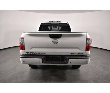 2024 Nissan Titan Crew Cab SV 4x4 is a White 2024 Nissan Titan Crew Cab Truck in Orlando FL