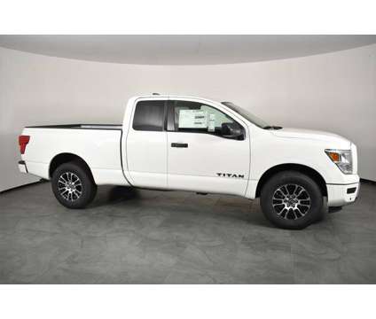 2024 Nissan Titan Crew Cab SV 4x4 is a White 2024 Nissan Titan Crew Cab Truck in Orlando FL