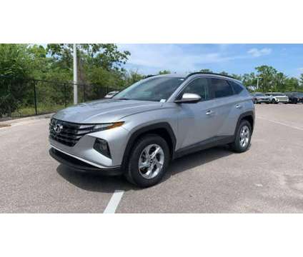 2022 Hyundai Tucson SEL is a Silver 2022 Hyundai Tucson SUV in New Port Richey FL