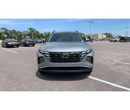 2022 Hyundai Tucson SEL is a Silver 2022 Hyundai Tucson SUV in New Port Richey FL