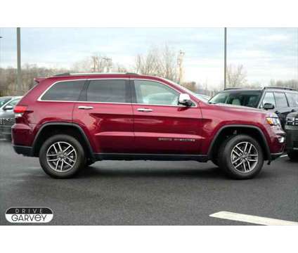 2021 Jeep Grand Cherokee Limited 4x4 is a Red 2021 Jeep grand cherokee Limited SUV in Queensbury NY