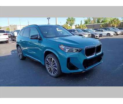 2024 BMW X1 M35i is a Blue 2024 BMW X1 SUV in Jacksonville FL