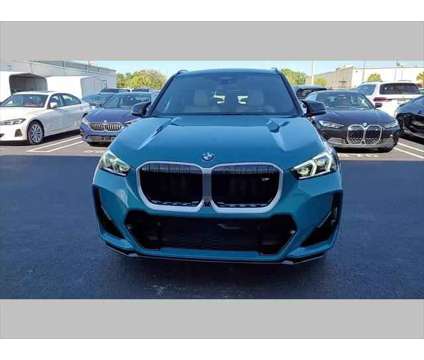 2024 BMW X1 M35i is a Blue 2024 BMW X1 SUV in Jacksonville FL