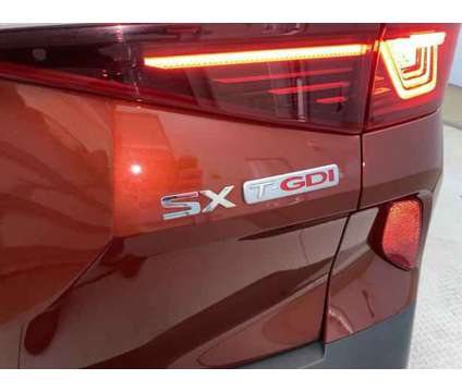 2021 Kia Seltos SX Turbo is a Orange 2021 SUV in Jacksonville NC