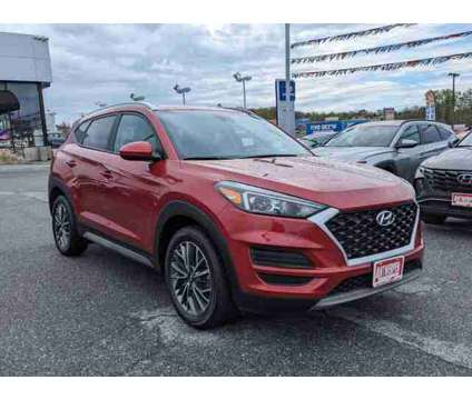 2021 Hyundai Tucson SEL is a Red 2021 Hyundai Tucson SUV in Catonsville MD