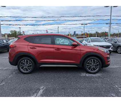 2021 Hyundai Tucson SEL is a Red 2021 Hyundai Tucson SUV in Catonsville MD