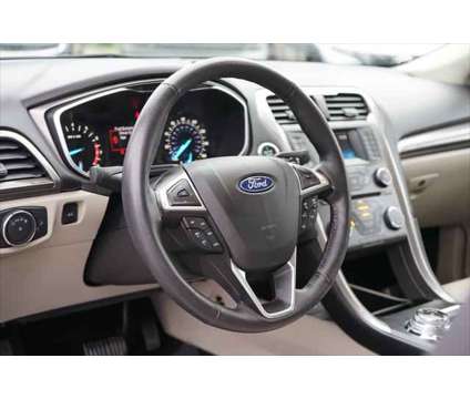 2018 Ford Fusion SE is a Blue 2018 Ford Fusion SE Sedan in Edmonds WA
