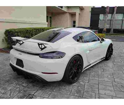 2020UsedPorscheUsed718 CaymanUsedCoupe is a White 2020 Porsche 718 Cayman Car for Sale in Orlando FL