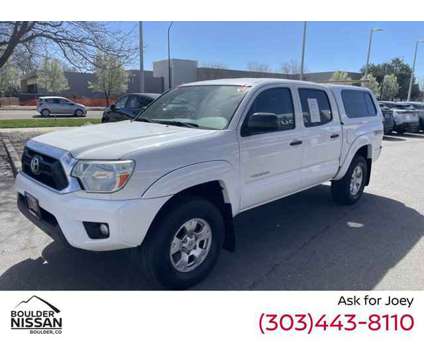 2015 Toyota Tacoma TRD Off Road is a White 2015 Toyota Tacoma TRD Off Road Car for Sale in Boulder CO