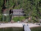 Priest Lake year round cabin with 152 foot frontage! Flat beach