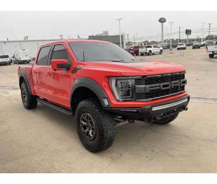 2022 Ford F-150 Raptor 37 PERFORMANCE PACKAGE is a Orange 2022 Ford F-150 Raptor Truck in Corsicana TX